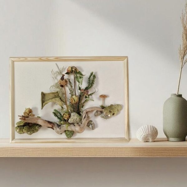 Botanical wall art created from natural materials in green tones
