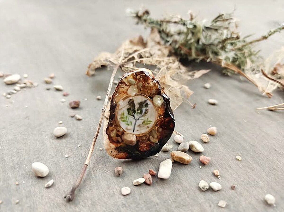 Forest ring made on a dried polypore slice — decorated with tiny natural materials and moss